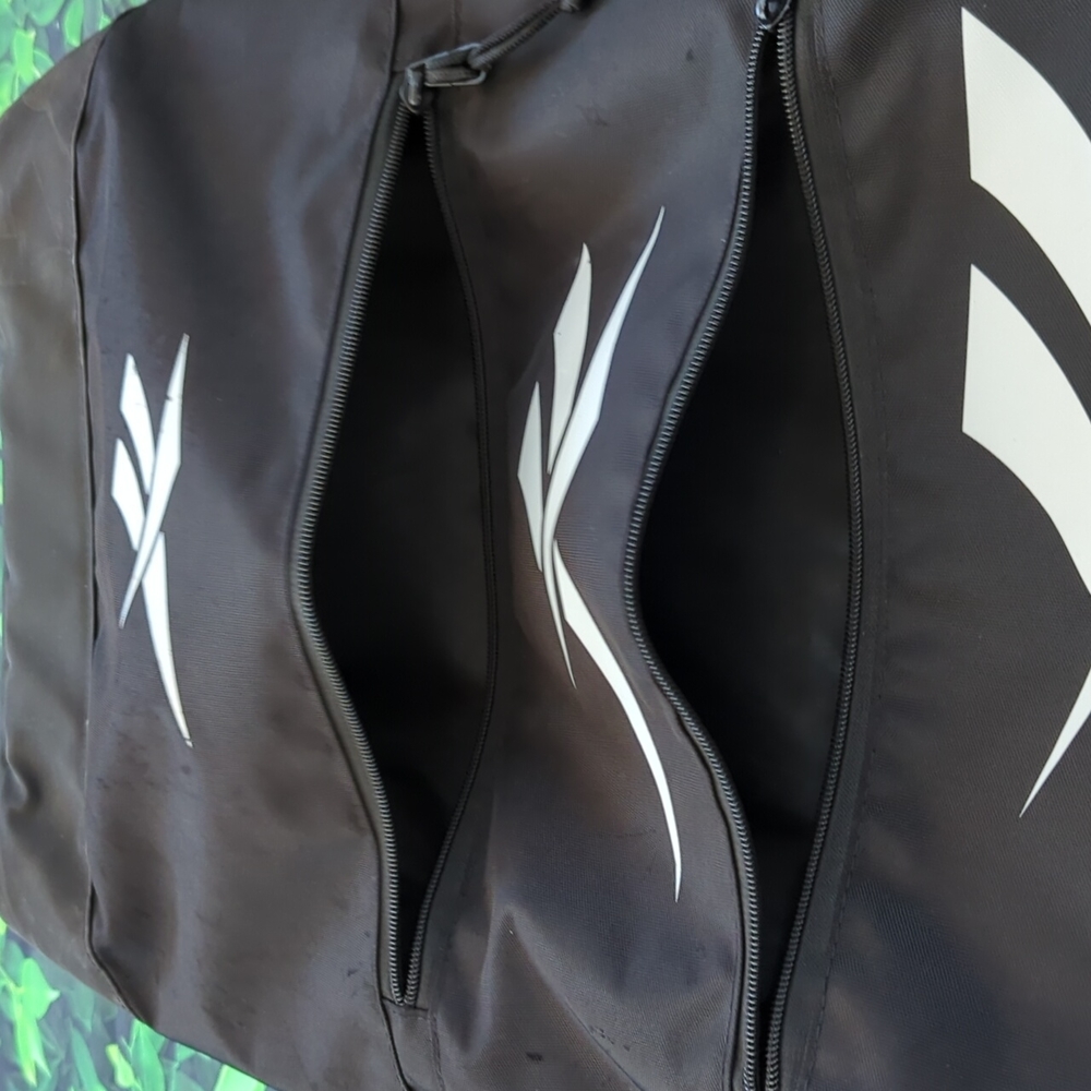 Black Reebok Backpack With Unique Tiered Zipper Pocket Design - Picture 4 of 15